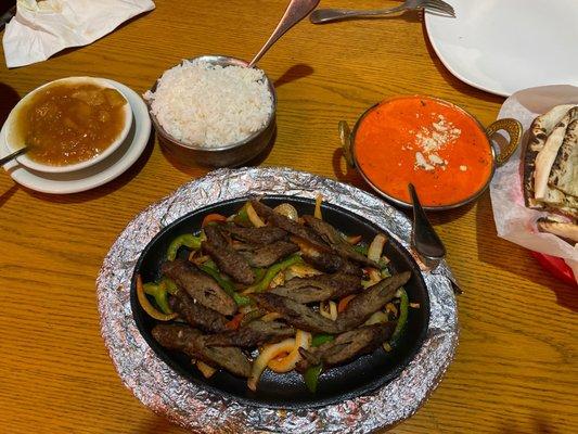 Seekh kabob, chicken masala, mango chutney and rice