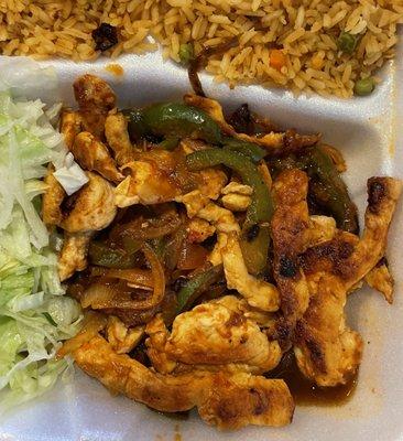 Chicken fajitas were very good. No tomatoes, easy onion & peppers, extra rice instead of beans.