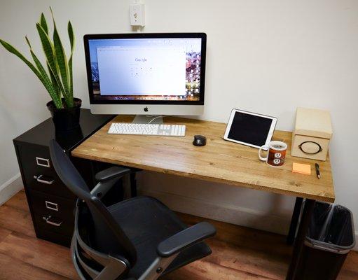 Desk in the Dedicated Desk office at Outlet Coworking