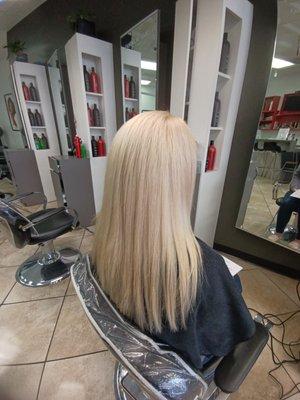 Bleaching, toning, blowdry, and flat ironing by Zabel.