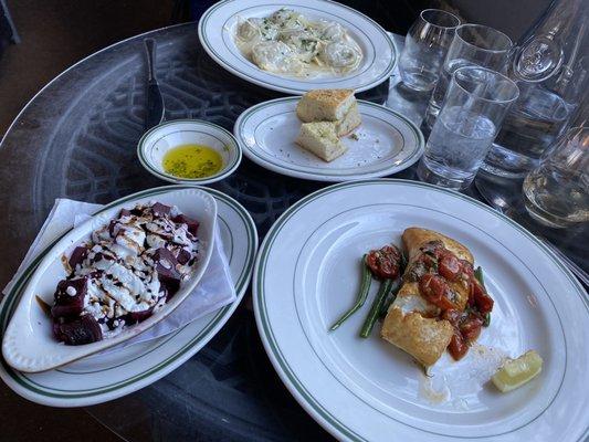 Pan fried halibut, mushroom stuffed raviolis and beets with melted mozzarella.