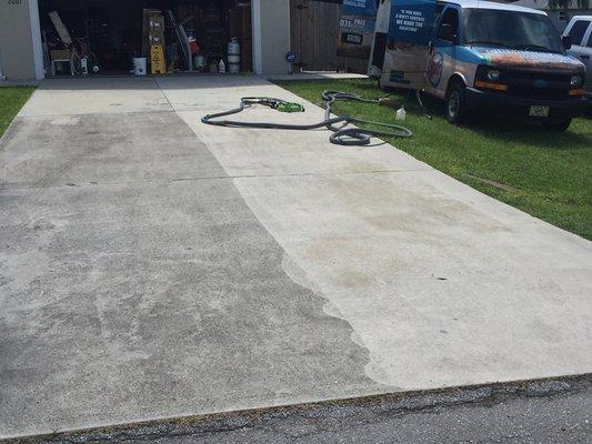 Power washed half of a driveway.