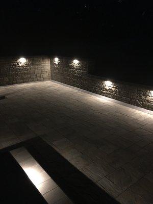 Lighting in the wall and under the steps.