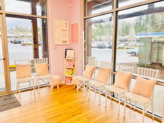 Waiting area for family and friends with little book nook