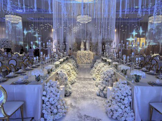 Walk way from the dance floor looking to the bride and grooms table ahead.