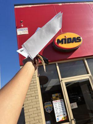 Midas front door and receipt.