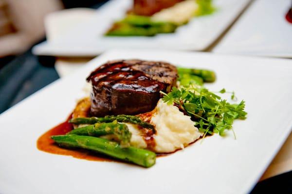 Filet Mignon with Asparagus Spears on a bed of Mashed Potatoes