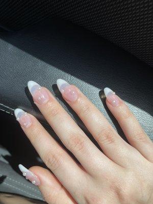 Almond nails with pearls I did clear but you can do natural pink so it isn't see through this is just what I liked