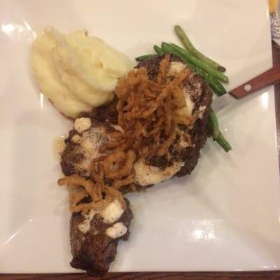 Ribeye with horseradish cream sauce and Gorgonzola cheese. Served with mashed potatoes and green beans.