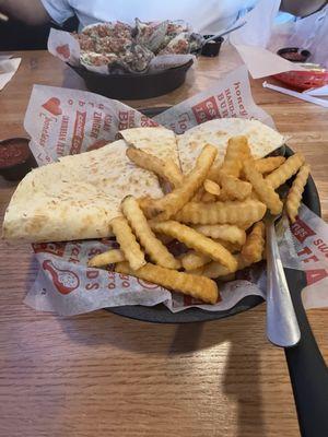 Chicken quesadilla with fries