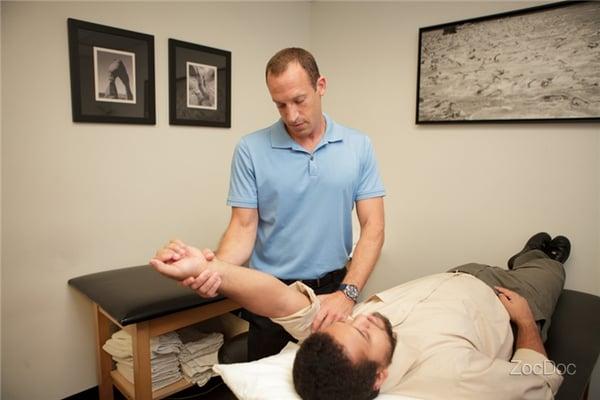 Our owner, Jason working on a patient.