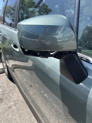 New side view mirror cap, paint matched.  We had to order the black bottom part from Subaru of Glendale.