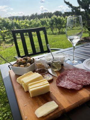 Meats, cheeses, olives, honey and dry Riesling