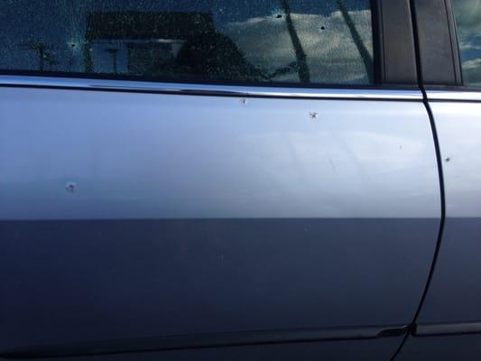 BULLET HOLES IN MY VEHICLE I WAS TOLD WAS SAFE LEAVING AT ENTERPRISE RENT A CAR. AWFUL EXPERIENCE.