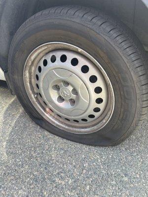 BRAND NEW 3 WEEK OLD FLAT TIRE!!! I WAS CHARGED FOR ANOTHER REPLACEMENT