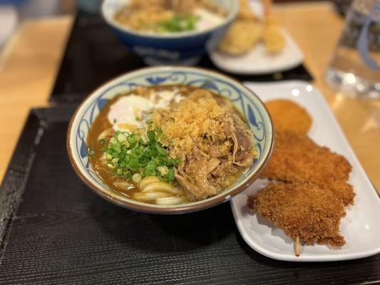 Curry Nikutama with side of Chicken Katsu and Potato Croquette