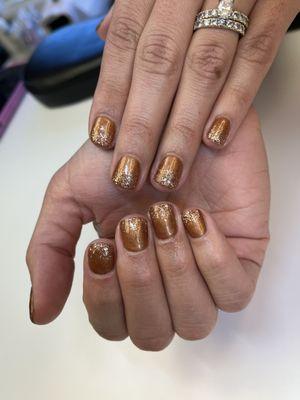 Fall bronze color with DND Desert Spice ombré glitter application.