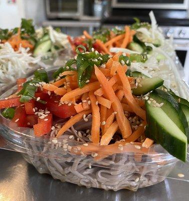 Organic gluten-free vegan soba noodle salad with spicy peanut dressing