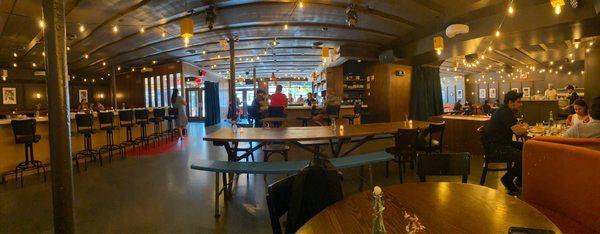 Panorama of the bar and dining area of the restaurant.