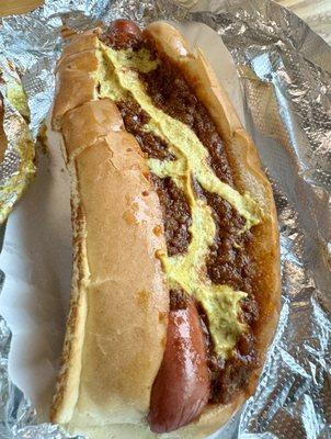 Chili dog with cheese and mustard