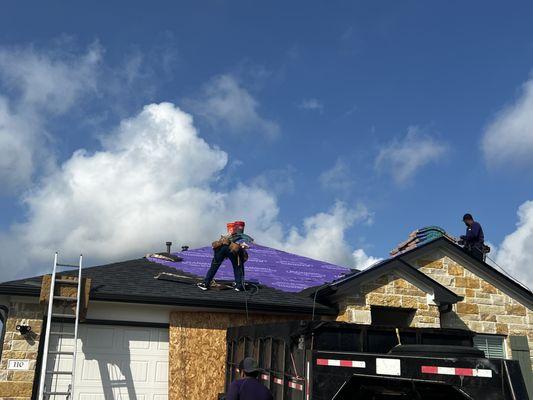 Placing foam on ladder to protect gutter paint!