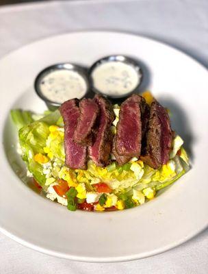 Blu cheese wedge salad with steak.