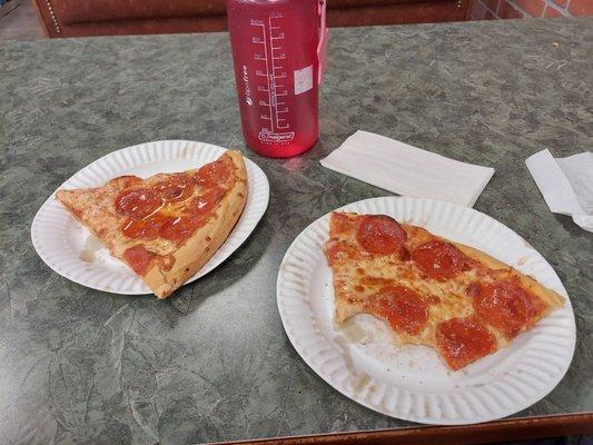 two pepperoni slices