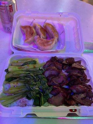 Pan Fried Dumplings Chinese BBQ Pork with chinese Broccoli over rice