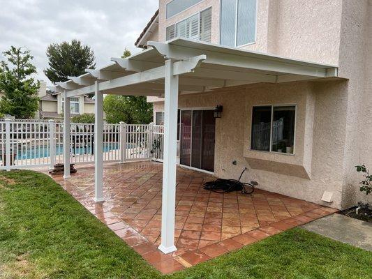 Pool fencing and solid patio