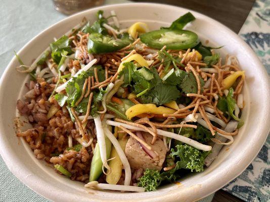 Tofu and brown rice crispy noodles jalapeños and mango and cucumber salad