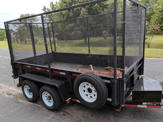 Our 15 cubic yard trailer- it can fit about 8 refrigerators or couches plus stuff between them.