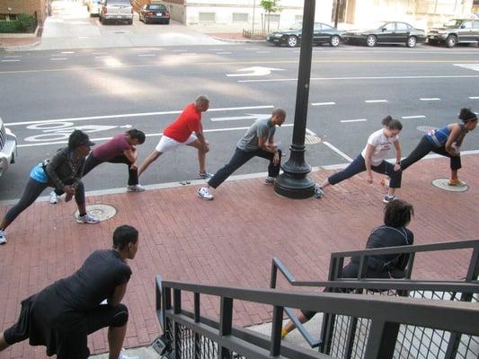 Fitness Heights Intl Running Group  preparing for a morning run in the city. Training for a 5K, 10K, Ten Miler, Half Marathon.