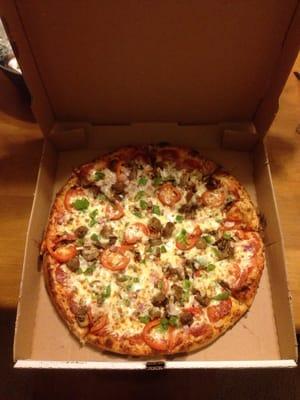 Large Ultimate pizza with no olives, sub tomatoes. $12 carry out.