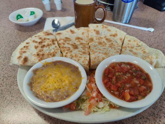 Huge breakfast quesadilla aka lazy fat burrito. I forced myself to eat at least two slices and took the rest home.