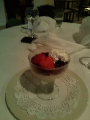 Panma Cotta agli agrumi.  Creamy, not too sweet, with fresh strawberries.  Perfect close for a great meal.