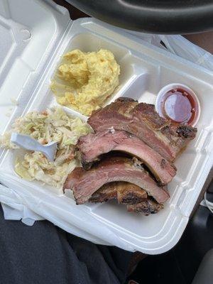 My hubby's rib plate, it made me second guess my order. Great flavor and we loved the vinegar based sauce.