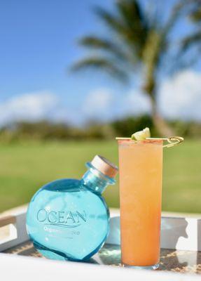 Ocean Organic Vodka, POG juice, soda, li-hing mui garnish