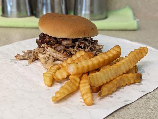 Barbecue sandwich (smoked on premises) and crinkle-cut fries