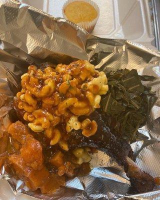 Smoked Soul Food Turkey Leg With Southern Candy Yams, Grandma Jones Collard Greens, Five Cheese Mac and Cheese With our House BBQ Sauce.