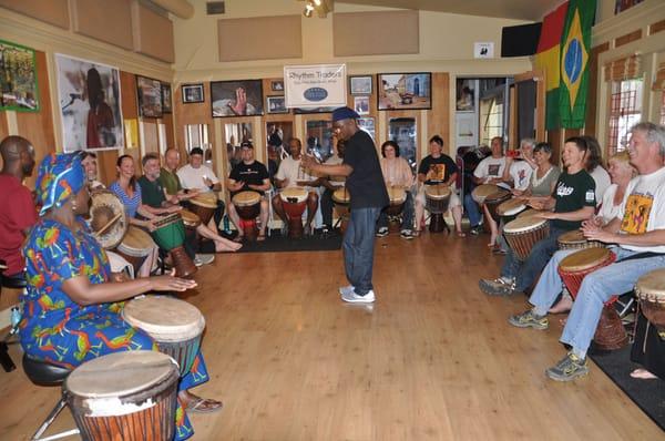 Master Djembe drummer, Mamady Keita, teaches one of his djembe workshops in the Rhythm Traders Player's Lounge.