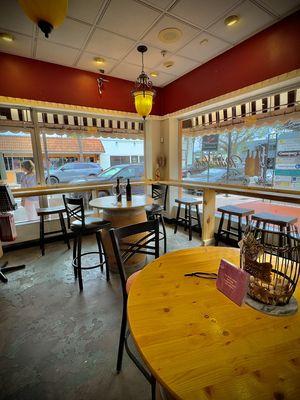 Wine barrel and window seating at The Wine Lady, Cocoa Village wine bar.