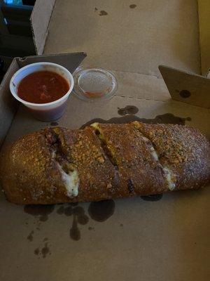 Stromboli! Mine is loaded with pepperoni, bacon and meatballs.