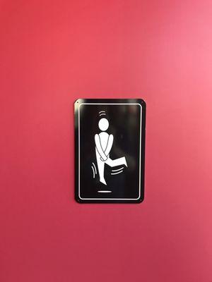 Men's bathroom sign on the door.