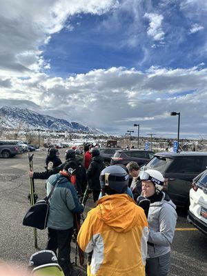 Long line at the parking lot for the bus