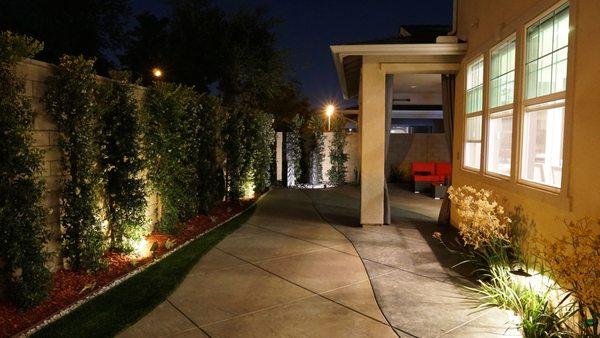 Stamp concrete and Artificial grass  plus out door lighting.