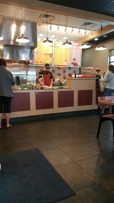 Random people ordering delicious pitas