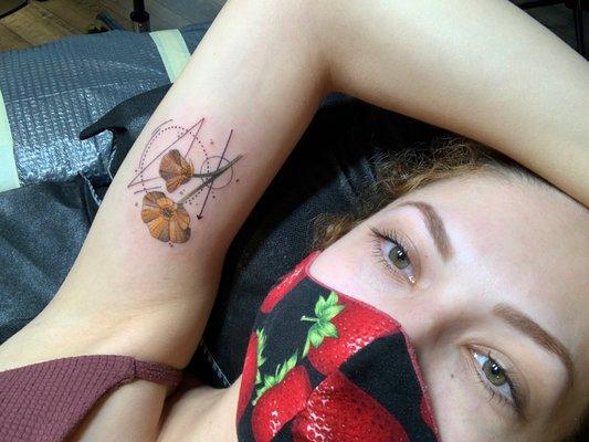 Custom tattoo by Dillon, California poppies with geometric line work.