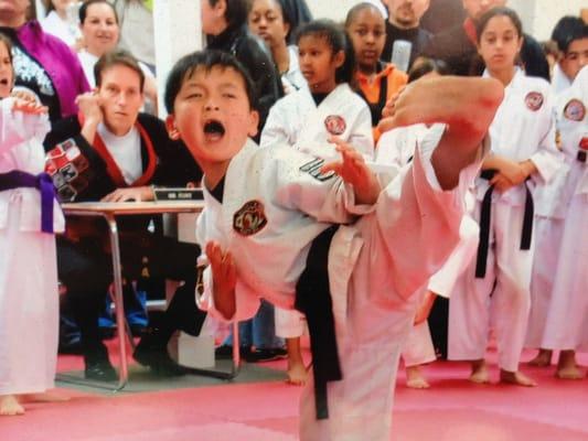 Demonstrating a great side kick at the Tournament