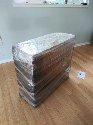 Wrapping furniture with plastic wrap is part of our service and it is free of charge!