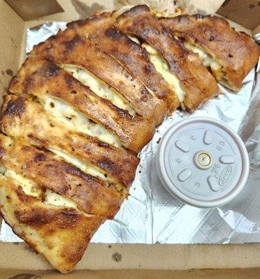 Chicken and broccoli calzone (minus the onions), $11.99. Delicious!